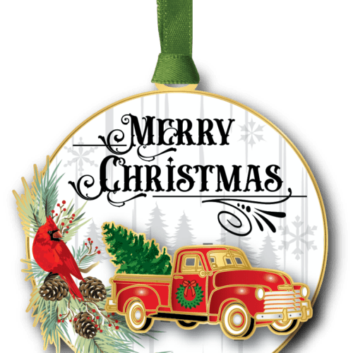 Christmas ornament featuring a vintage red pickup truck carrying a Christmas tree, accented by a cardinal and evergreen branches.