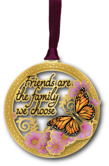 Round ornament featuring a monarch butterfly, pink flowers, and the phrase "Friends are the family we choose."