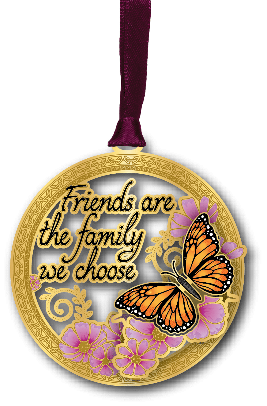 Round ornament featuring a monarch butterfly, pink flowers, and the phrase "Friends are the family we choose."